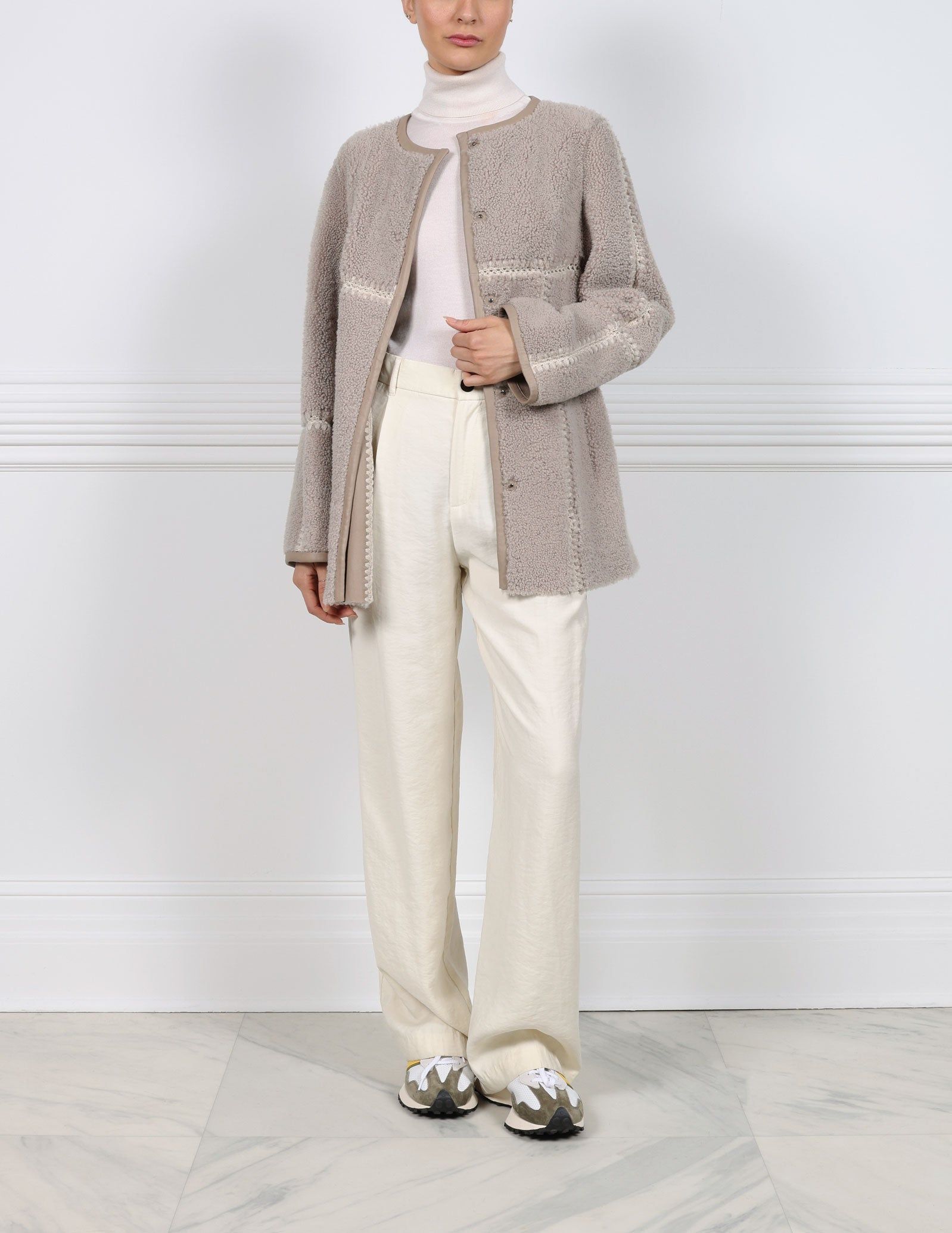 The Mila Shearling Jacket sold by Pologeorgis