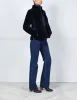 The Elaine Shearling Jacket sold by Pologeorgis