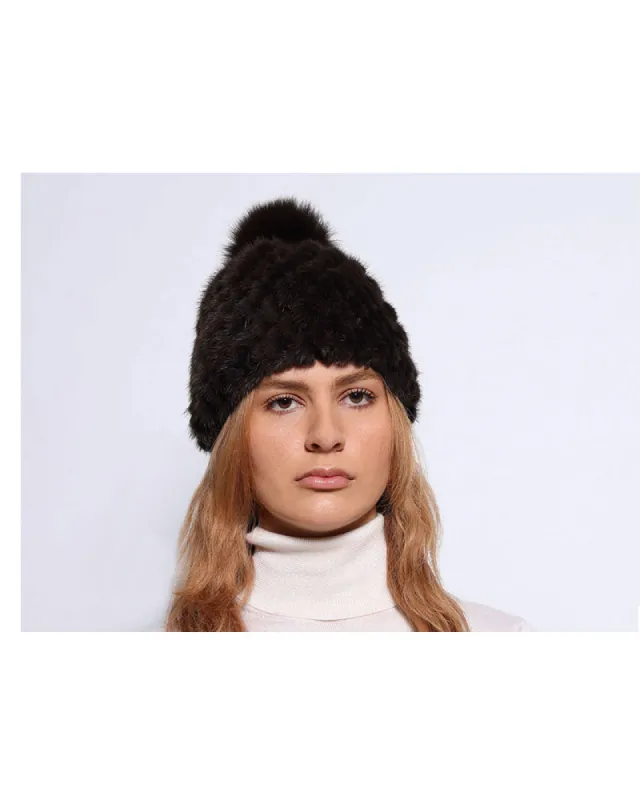 The Knit Mink Fur Hat with Fox Pom in Multiple Colors sold by Pologeorgis