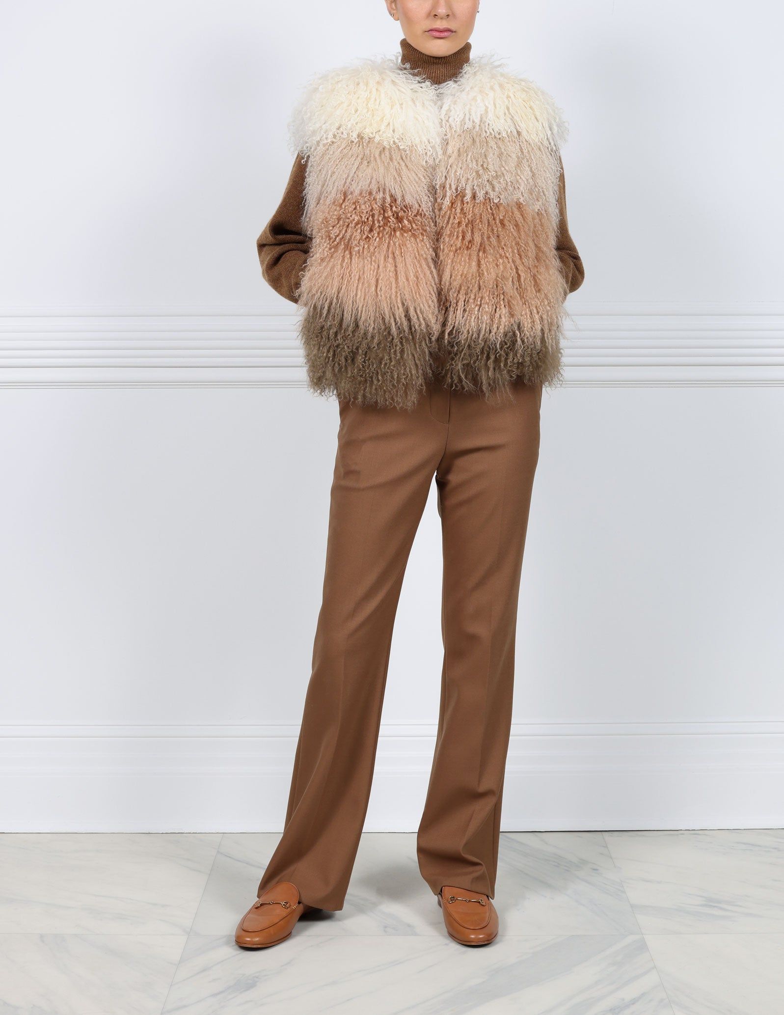 Color Block Striped Curly Shearling Vest sold by Pologeorgis