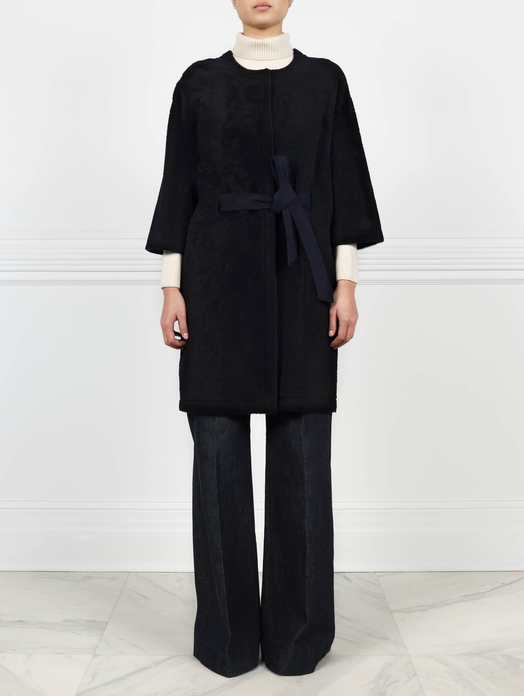 Curly Shearling Belted Coat in Navy sold by Pologeorgis