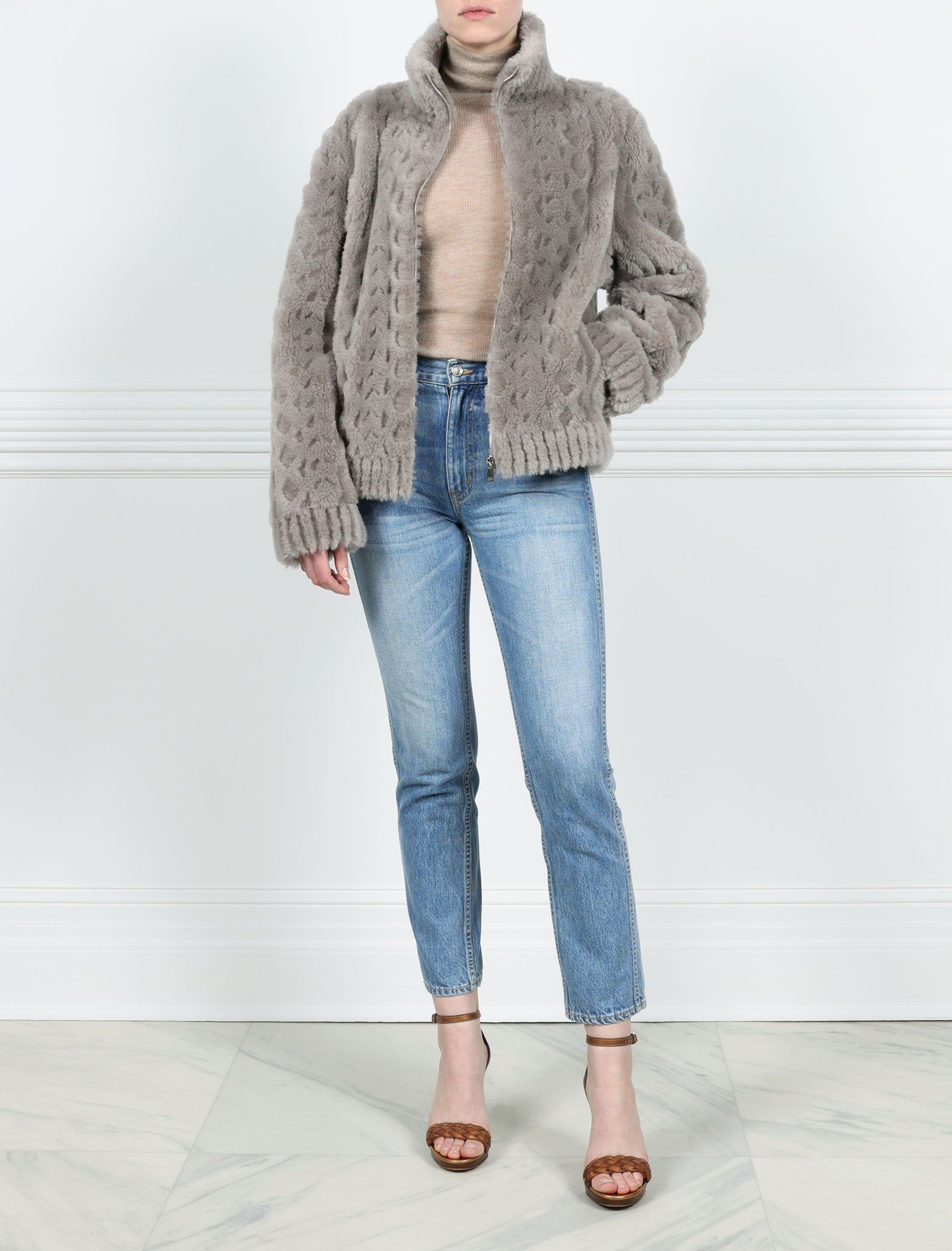 The Amber Grooved Wool Zip Jacket sold by Pologeorgis