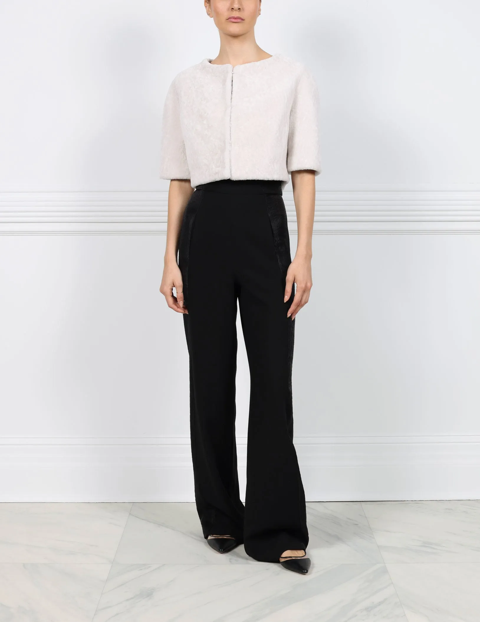 The Cosmos Shearling Jacket sold by Pologeorgis