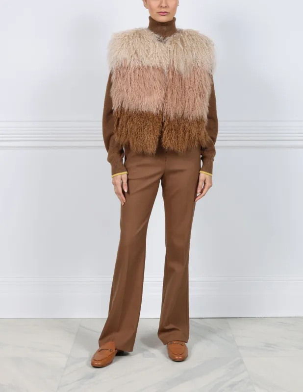 Tri-Tone Curly Shearling Vest sold by Pologeorgis