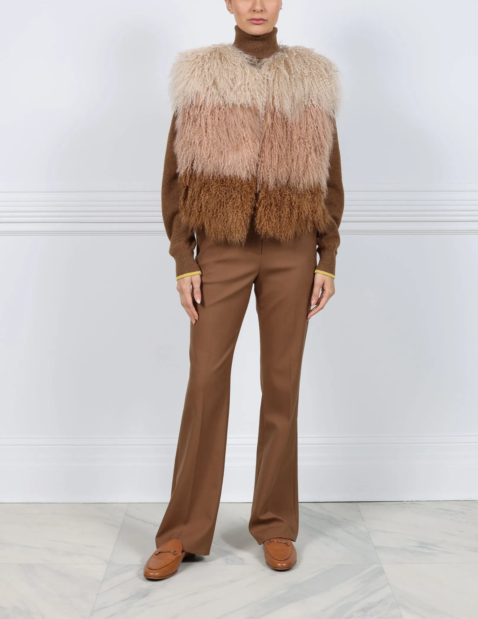 Tri-Tone Curly Shearling Vest sold by Pologeorgis