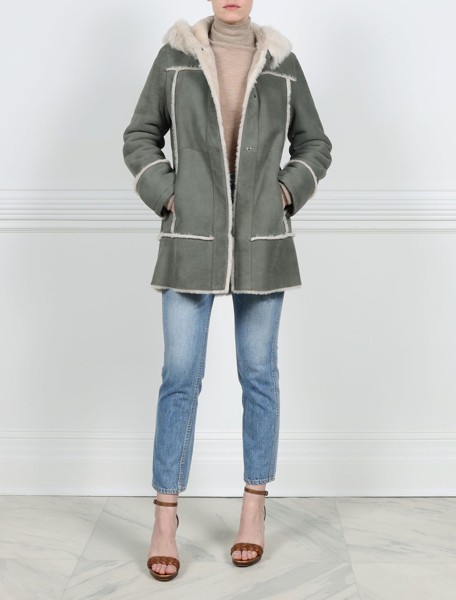 Hooded Shearling Coat sold by Pologeorgis
