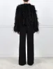 The Kiki Feather Jacket sold by Pologeorgis