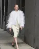 The Kiki Feather Jacket sold by Pologeorgis