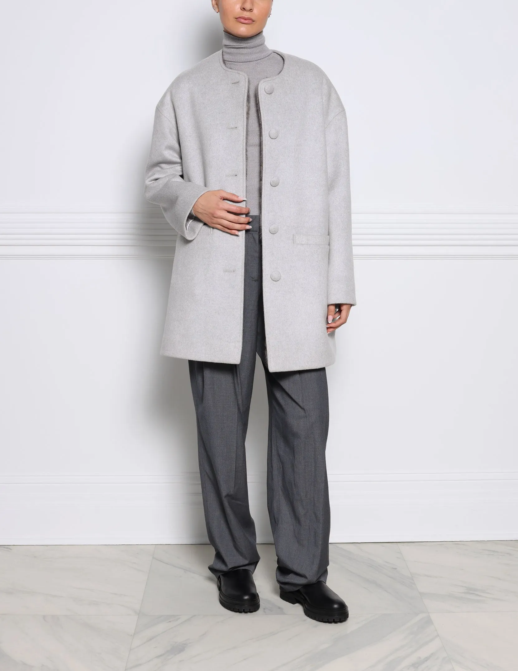 The Logan Mink Fur Lined Cashmere Coat sold by Pologeorgis