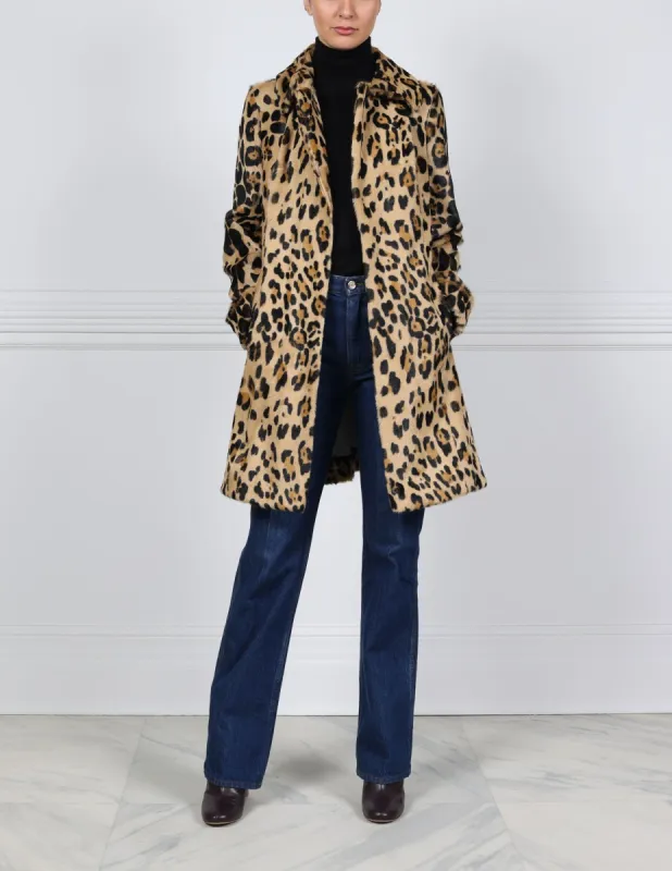 The Miggy Leopard Printed Shearling Coat sold by Pologeorgis