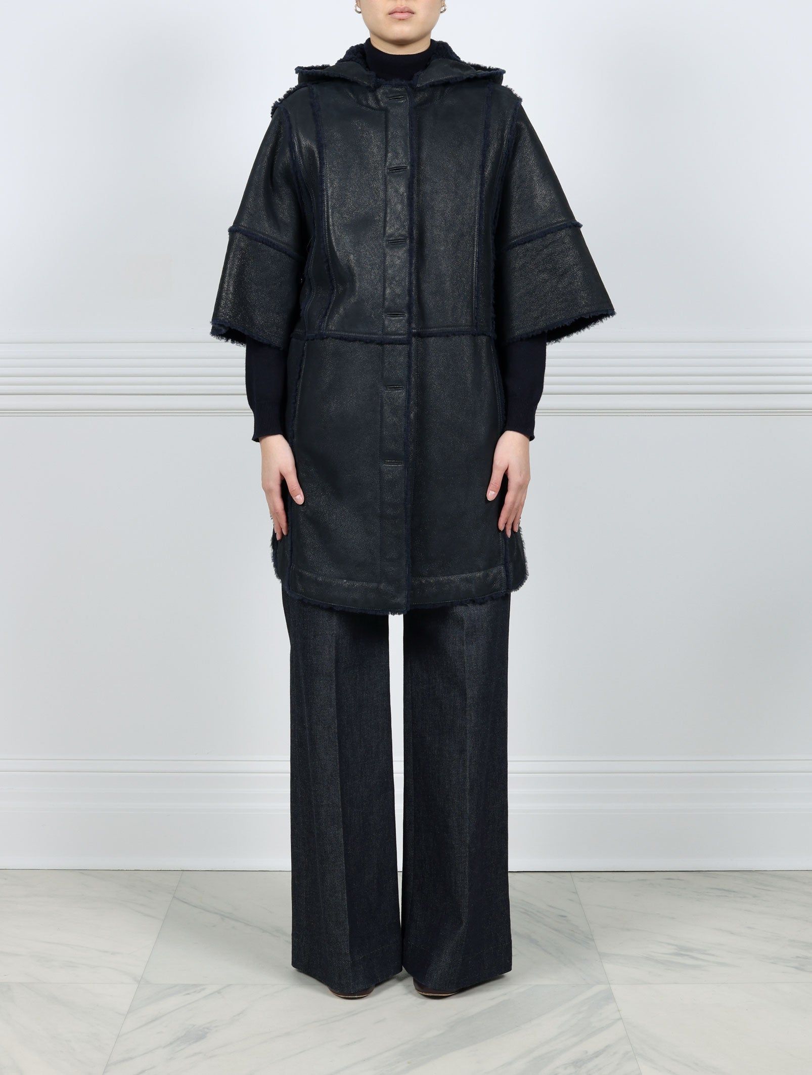 Short Sleeved Shearling Coat with Detachable Hood in Navy sold by Pologeorgis