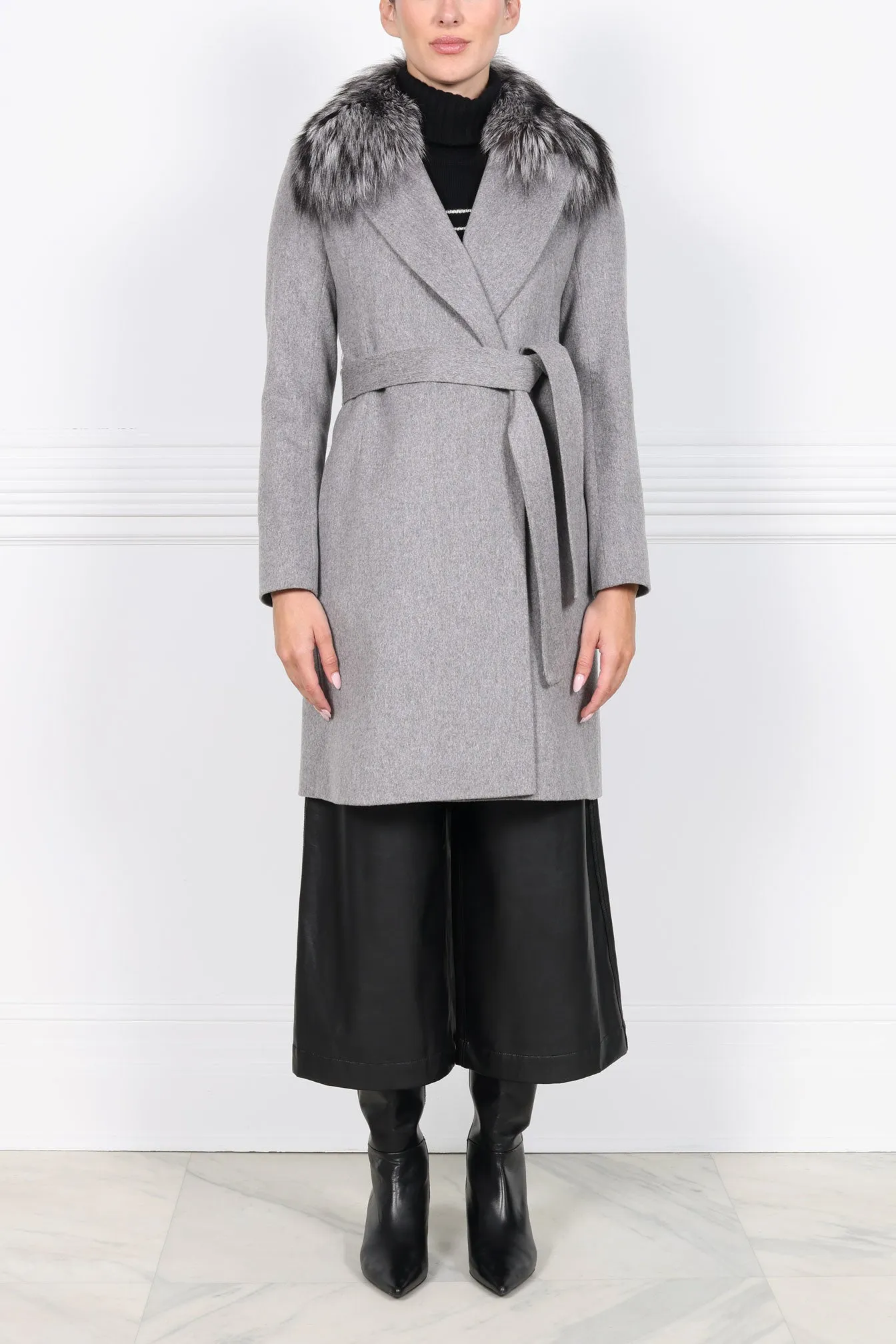 The Amal Wool Coat with Fur Collar sold by Pologeorgis