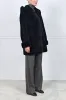 The Bella Plucked Mink Coat sold by Pologeorgis