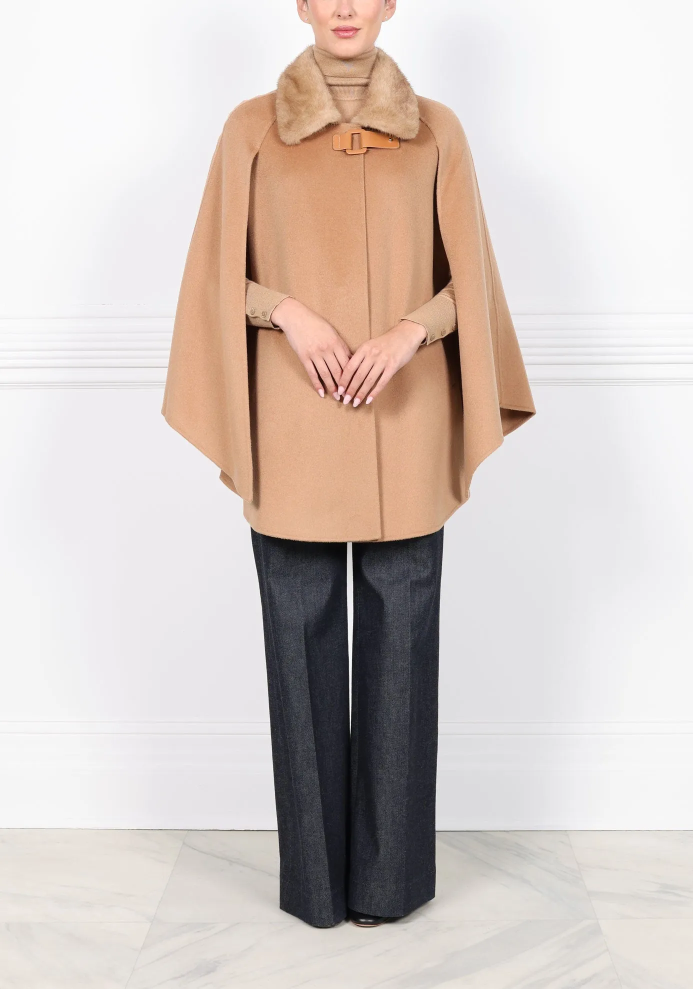 The Evelyn Cape with Mink Collar sold by Pologeorgis