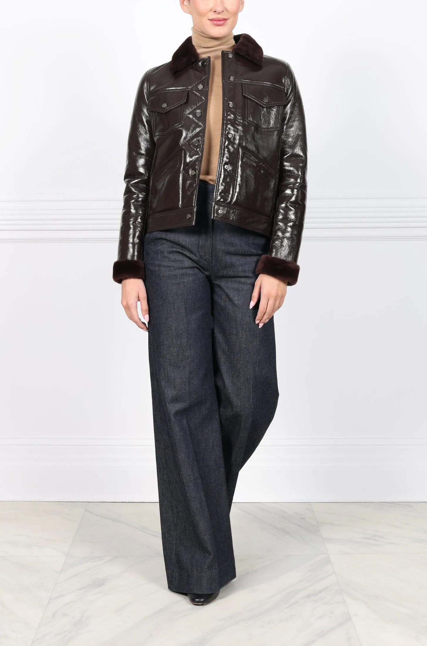 The Trucker Patent Shearling Jacket sold by Pologeorgis