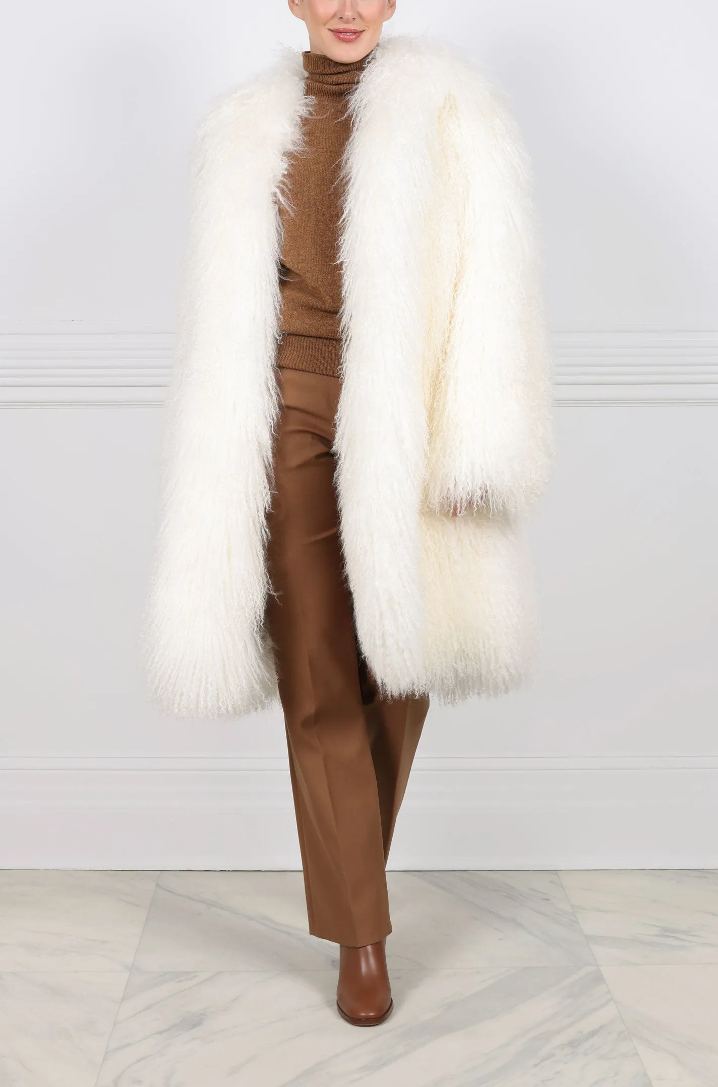 The Cassidy Shearling Coat sold by Pologeorgis
