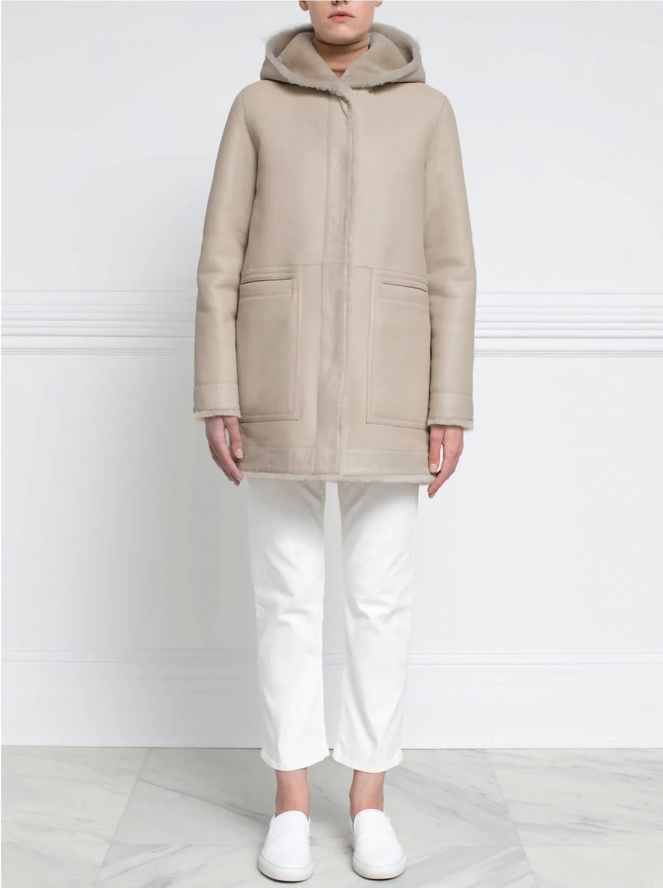 The Davie Hooded Shearling Coat sold by Pologeorgis