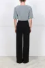 The Curly Cropped Shearling Jacket sold by Pologeorgis