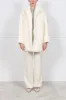 The Renee Oversized Shearling Coat sold by Pologeorgis