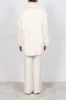 The Renee Oversized Shearling Coat sold by Pologeorgis