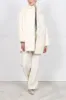 The Renee Oversized Shearling Coat sold by Pologeorgis