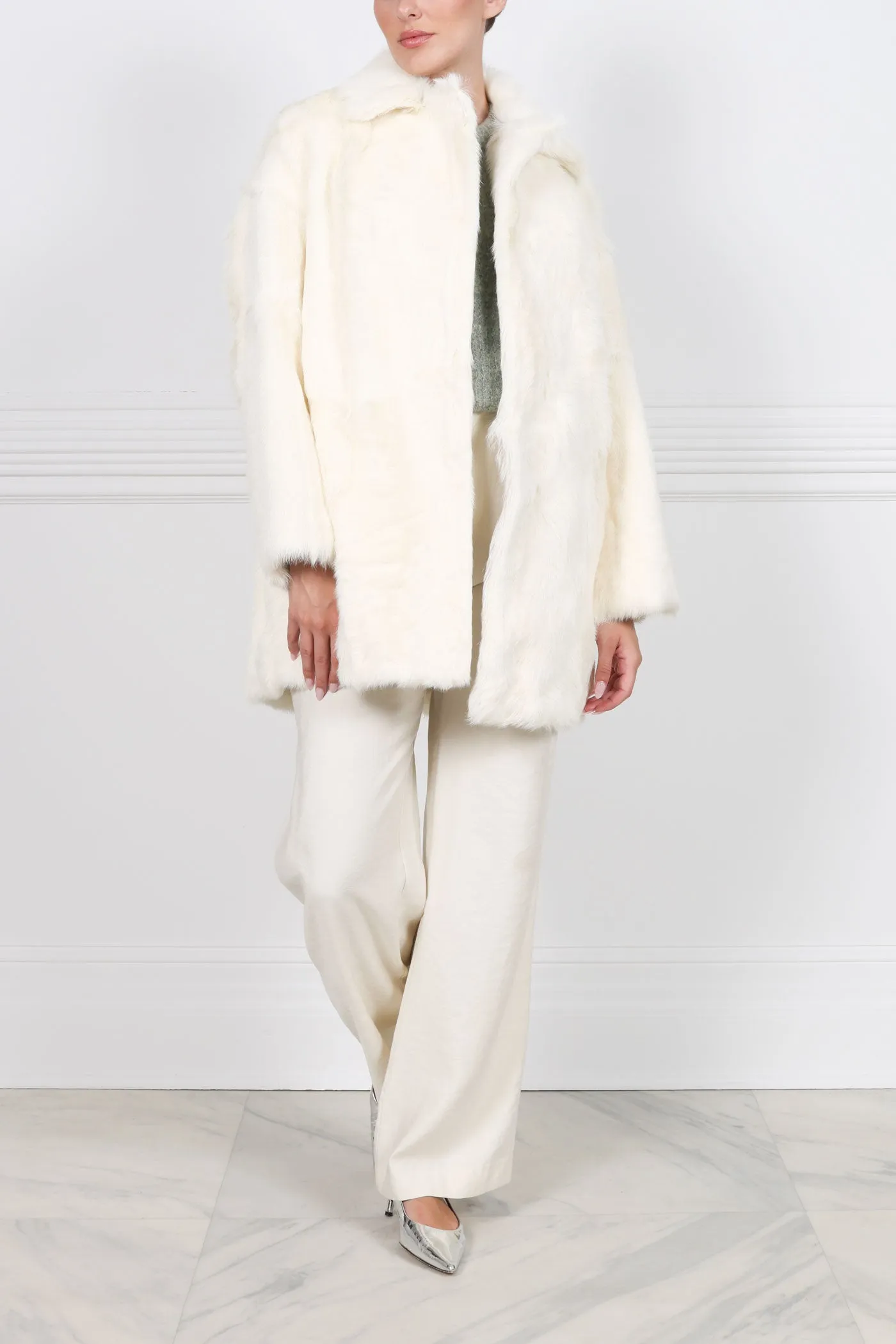 The Renee Oversized Shearling Coat sold by Pologeorgis