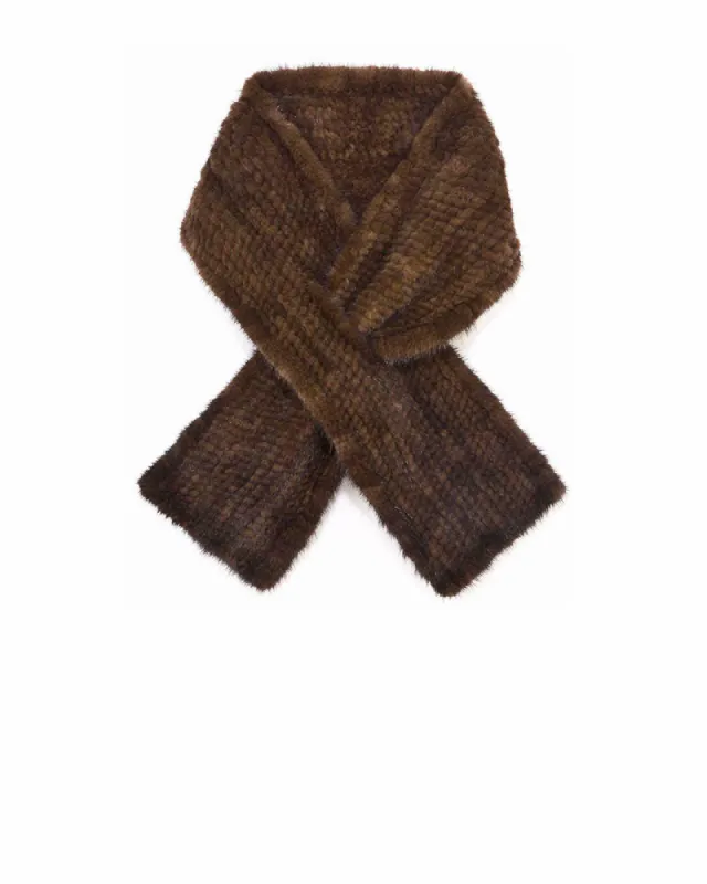 The Whistler Pull-Through Knitted Mink Scarf sold by Pologeorgis