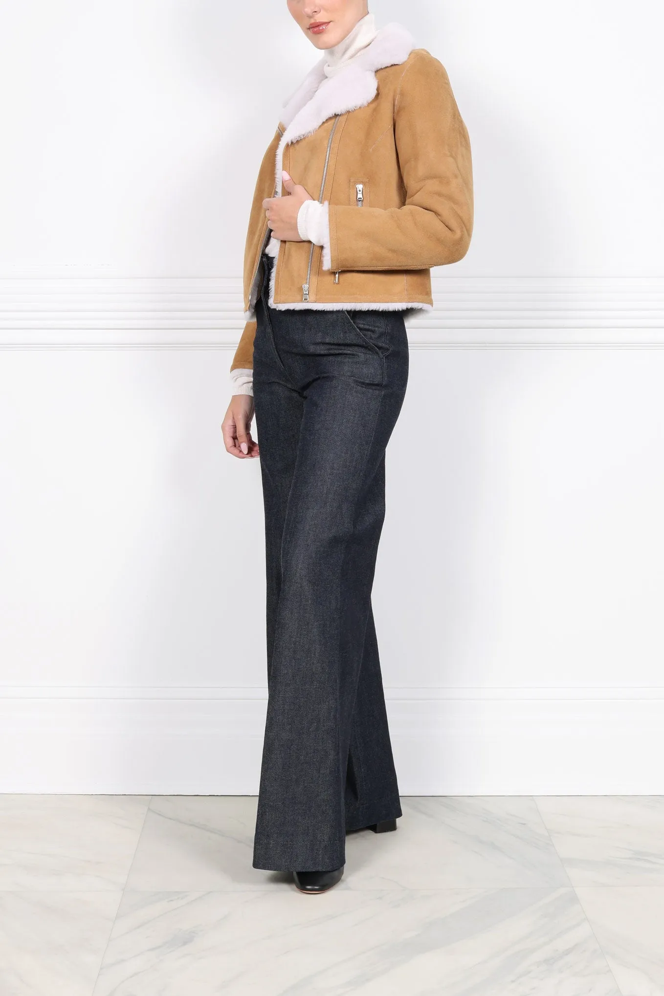 The Moto Shearling Jacket sold by Pologeorgis