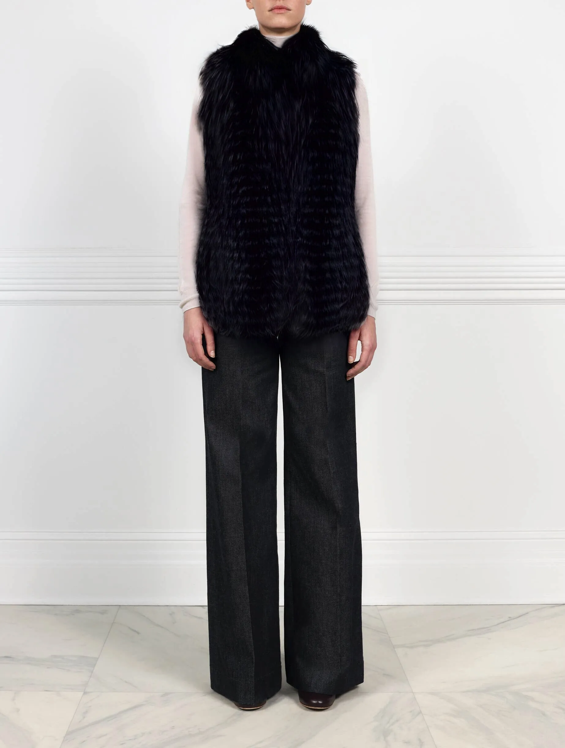 The Nina Stripped Fox Fur Vest sold by Pologeorgis