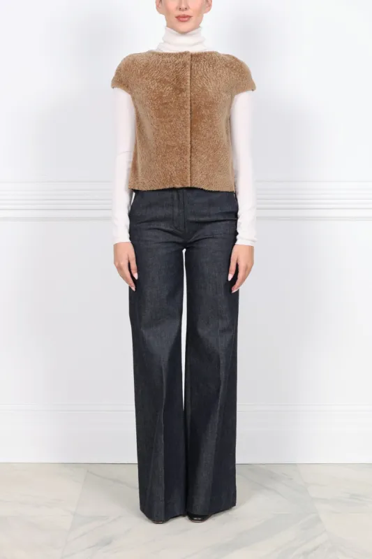 The  Cap Sleeve Shearling Vest sold by Pologeorgis