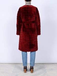 The Garnet Belted Shearling Coat sold by Pologeorgis