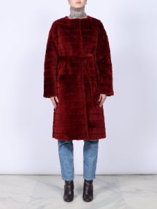 The Garnet Belted Shearling Coat sold by Pologeorgis