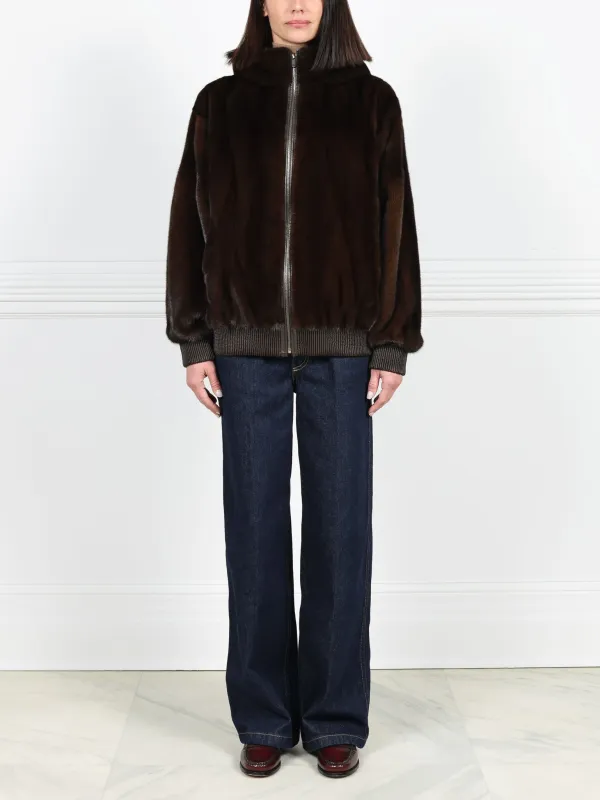 The Amanda Mink Hooded Bomber Jacket sold by Pologeorgis