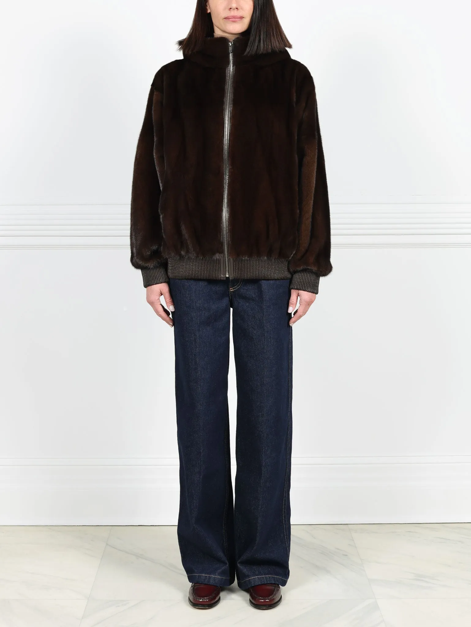 The Amanda Mink Hooded Bomber Jacket sold by Pologeorgis