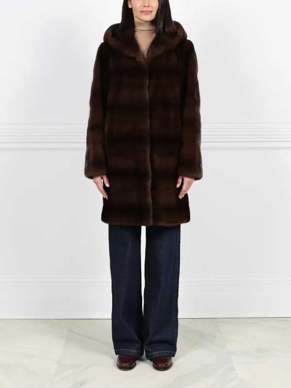 The Sharon Hooded Mink Fur Short Coat sold by Pologeorgis