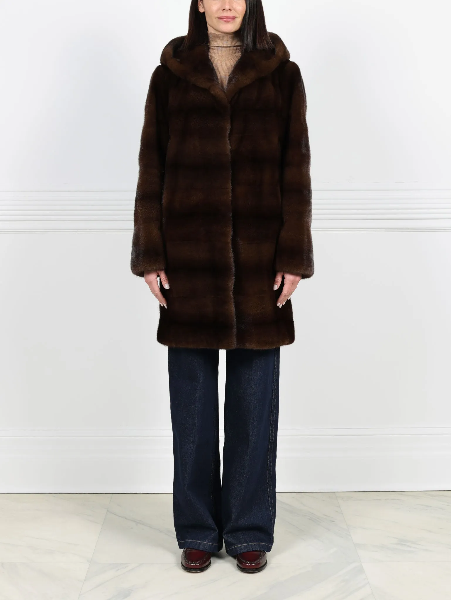 The Sharon Hooded Mink Fur Short Coat sold by Pologeorgis