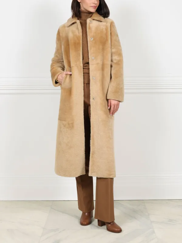 Camel Shearling Coat sold by Pologeorgis