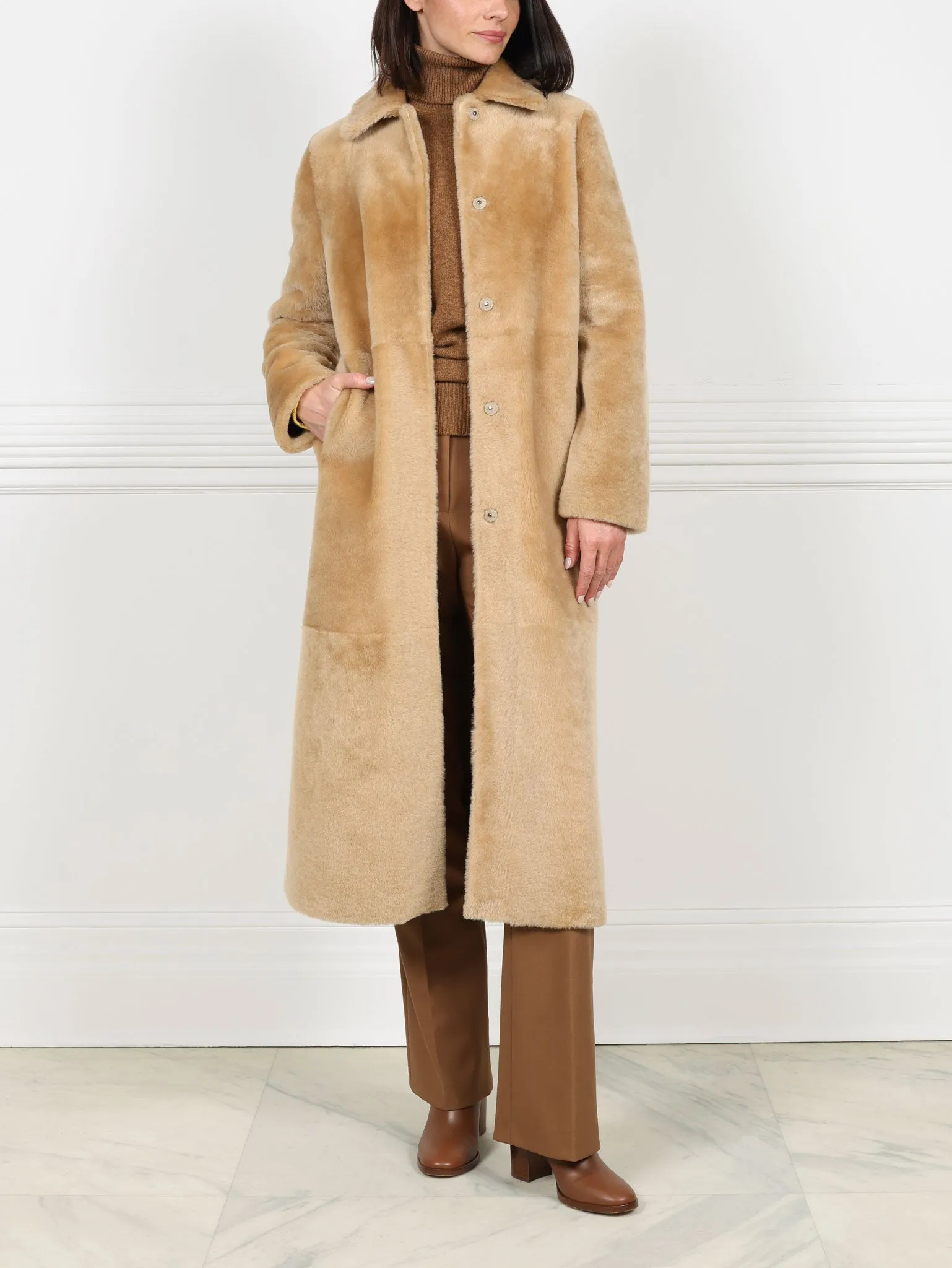 Camel Shearling Coat sold by Pologeorgis