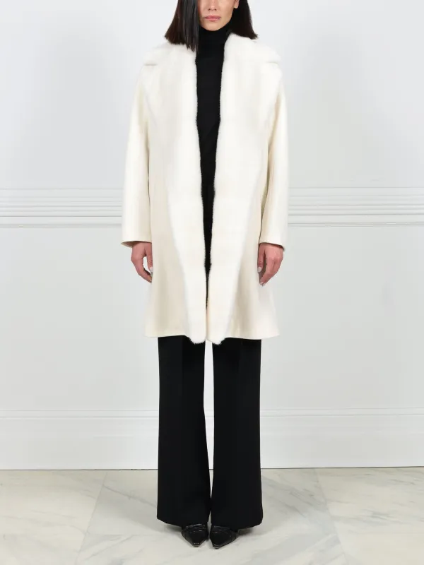 The Clutch Coat with Mink Fur sold by Pologeorgis