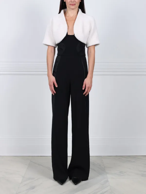 The Oval Shearling Shrug sold by Pologeorgis