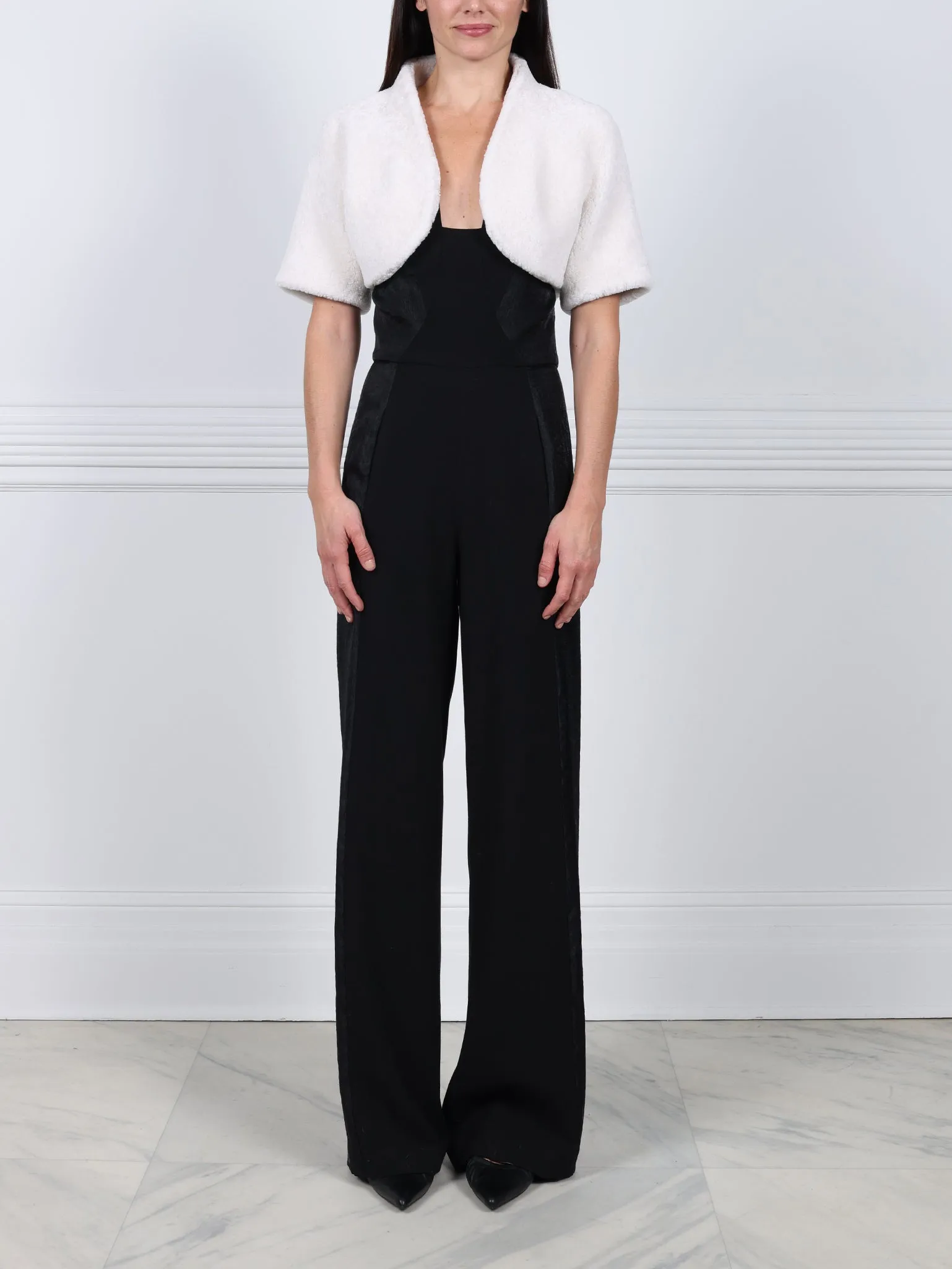 The Oval Shearling Shrug sold by Pologeorgis