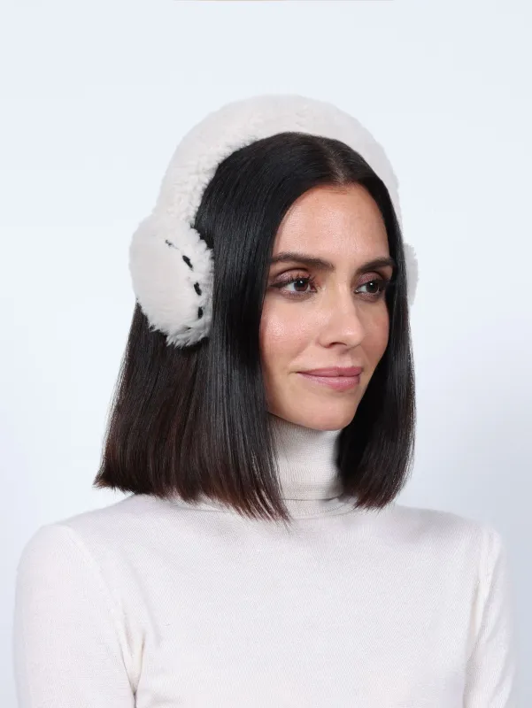 White Shearling Wrapped Earmuffs with Black Stitching Detail sold by Pologeorgis
