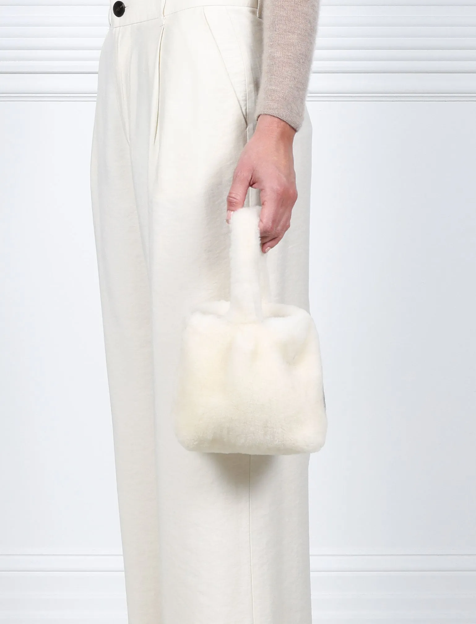 The Meow Mini in Ivory Shearling sold by Pologeorgis