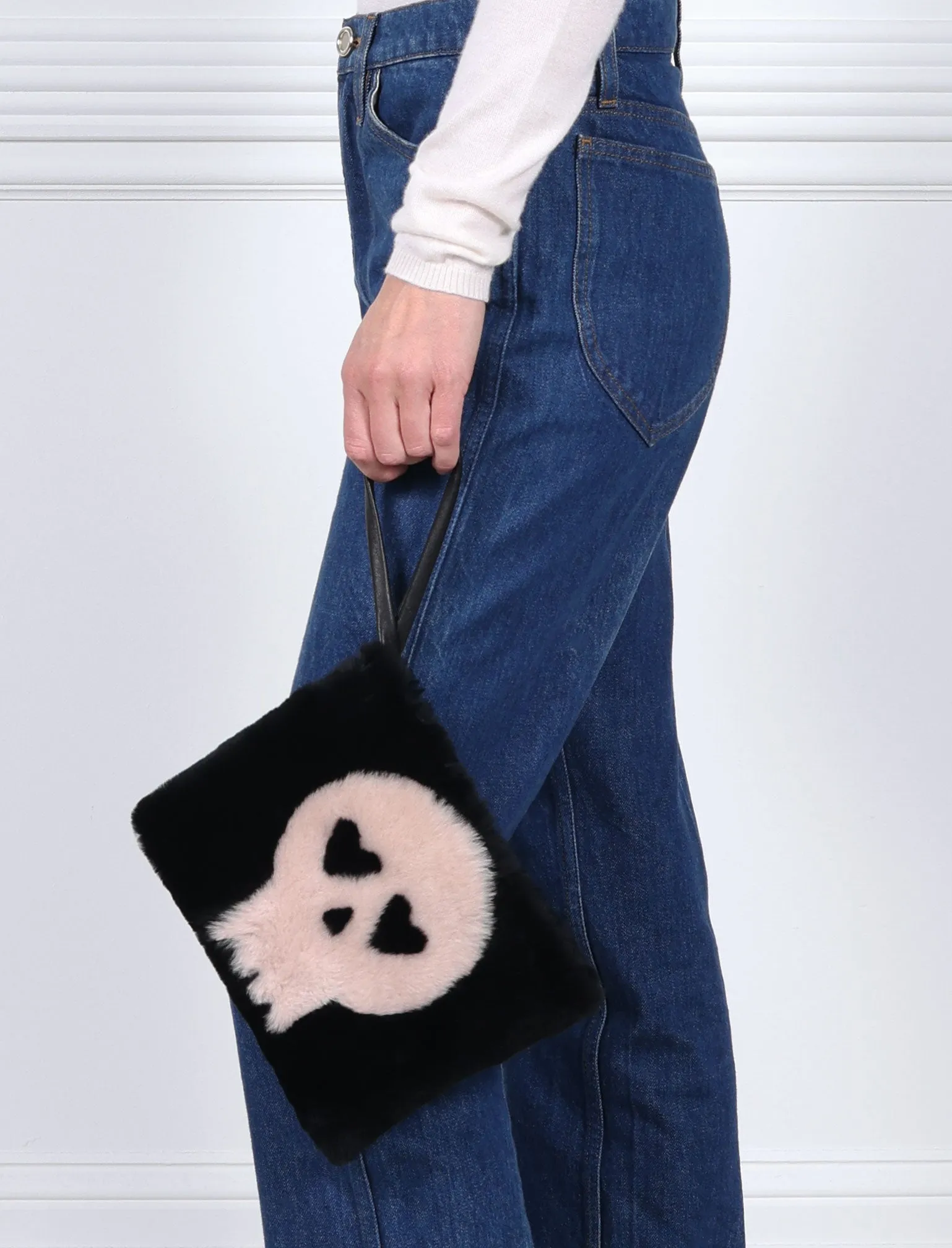 The Skull Shearling Intarsia Wristlet sold by Pologeorgis