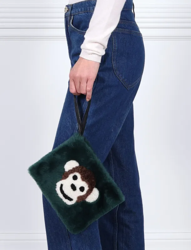 The Monkey Shearling Intarsia Wristlet sold by Pologeorgis