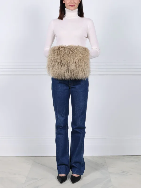 Curly Shearling Muff sold by Pologeorgis