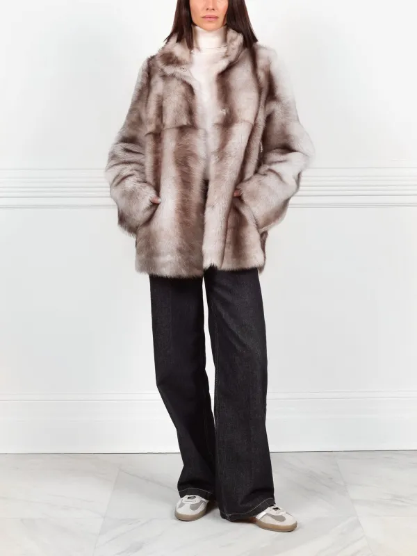 Chinchilla Dyed Shearling Coat sold by Pologeorgis