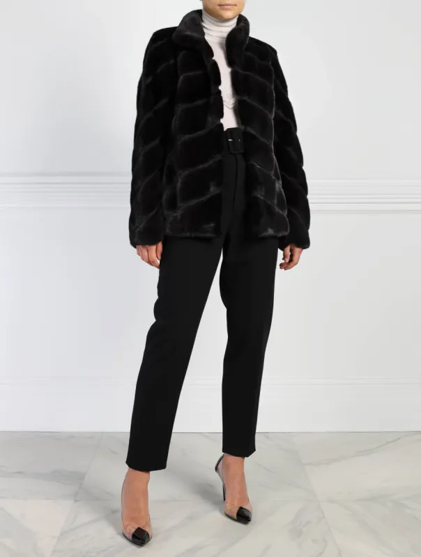 The Elsa Diagonal Mink Fur & Suede Jacket sold by Pologeorgis