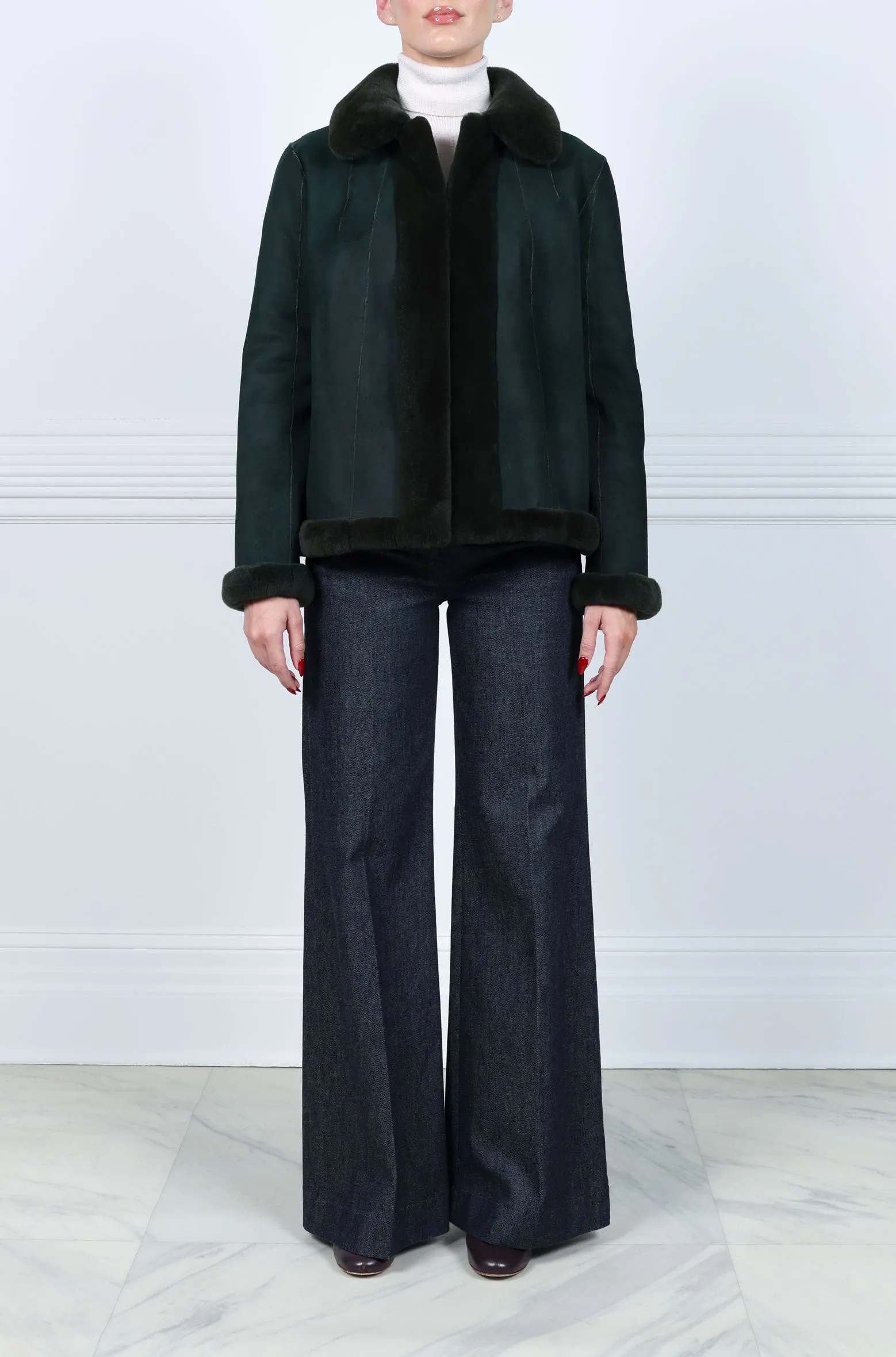 The Ilsa Plucked Green Mink Reversible Suedeback Jacket sold by Pologeorgis