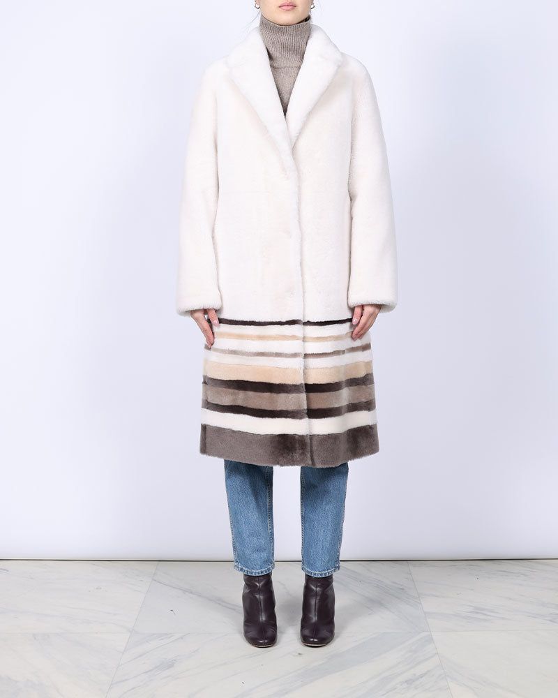 The Georgia Reversible Shearling Intarsia Coat sold by Pologeorgis